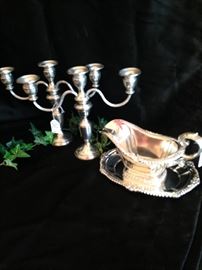 Silver plate candelabras and gravy boat with under plate