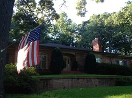 Please remember to enter from the east (left) side driveway.