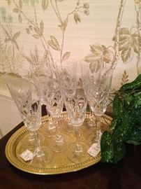 Crystal flutes on brass tray
