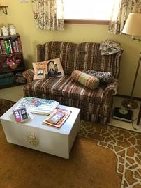 Very clean and comfortable apartment sized couch and vintage toy box