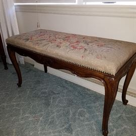 Needlepoint covered bench, carved legs