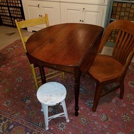 19th Century walnut drop-leaf table, odd chairs, white painted metal stool, oriental pattern rug