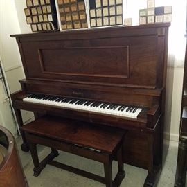 Farrand (Made in Holland, MI) restored upright manual pump player piano in working order.  Plays standard 88 note rolls.