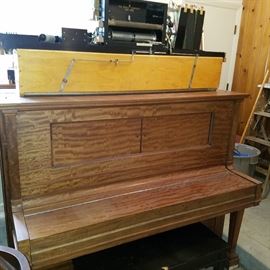 One of two (there's another behind it) partially restored Steinway 65/88 manual pump pianos. 