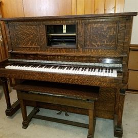 Story & Clark (Made in Grand Haven, MI) manual pump upright piano in restored, playing condition.  Plays standard 88 note rolls.