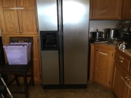 Kenmore Side by Side refrigerator with ice and water in door. 