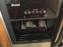 Kenmore Side by Side refrigerator with ice and water in door. 