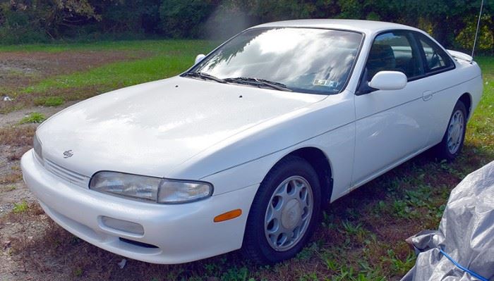 8PM: Estate Auto | 1995 Nissan 240SX Coupe with 71,392 Miles; 5-speed Manual Transmission; AM/FM Stereo with CD; Power Windows, Locks, Mirrors; White Exterior, Slate-Blue Cloth Interior, and much more. VIN: JN1AS44D2SW007019