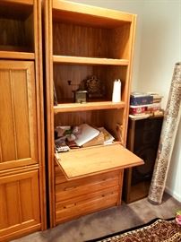 Third unit has flip down desk 