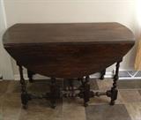 Vintage drop leaf table 48 inch round