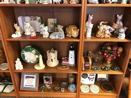 cat figurines, lighthouse and sand castle decor