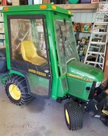 John Deere 445 tractor with hard cab