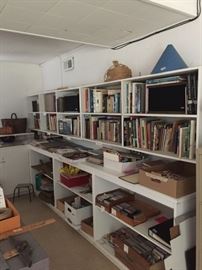 Overview of art studio with many art books for sale.