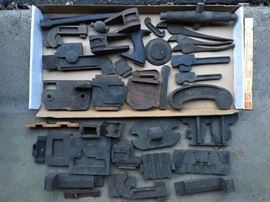 Group of wooden pattern molds.