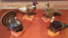 Hand carved pheasants, ruffed grouse, & turkey.