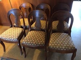 Six matching American Empire chairs.