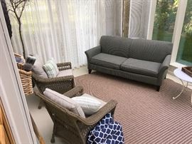 Couch, two “ wicker” chairs like new condition. Rug as well.