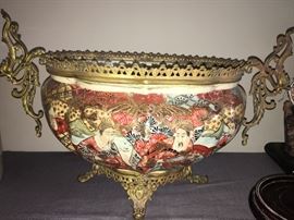 This urn is truly special, the colors are vibrant and the metal handles are dragons!  