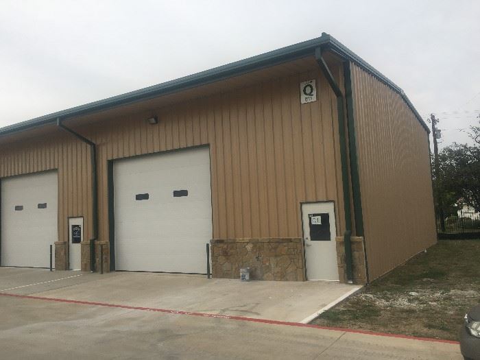 Front of the warehouse, all peaceful and quiet, loading will be by the door, parking on the other side