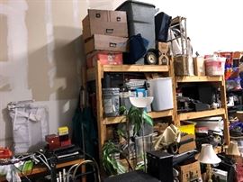 More things on the shelves to search through, those dresser shelves on top aren't wood. Other shelves are full of contractor stuff like nails and plumbing things, some tools hidden over here as well.