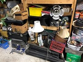 bunch of mats on the floor a drawer warmer on the shelf, some other misc things as well