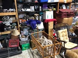 Jenny Lind Crib, best for décor or dolls maybe. some medical things on the shelves, some video game stuff and cords back there as well.