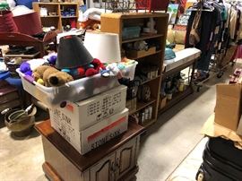 Nice wood end table, a couple of brand new stone sinks for just $150 each, more stuff on a shelf, a sofa table, a package of wood laminate flooring, just one though.