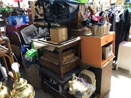 A Couple old Berkey end tables from the 1940's maybe, a south bend baby buggy with an ugly doll in it. There is an above ground pool in the box, I never opened it, so I have no idea what is in there or if it is in great condition.