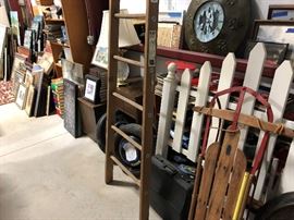 Another pic of the headboard, a metal sled, a 16 foot wood ladder and more misc