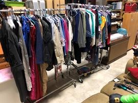 A few clothes on racks, careful with the second rack, it is dying. I also have boxes of clothes that were washed, but I have no room to display them, mostly jeans and women's clothing, some men's stuff, some kid's stuff, I have no clue on all the sizes.