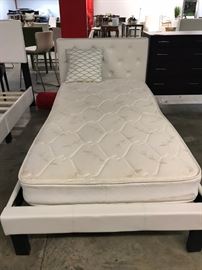 SINGLE FAUX LEATHER TWIN BED....ALSO HAVE PAIR OF SIMILAR BEDS.