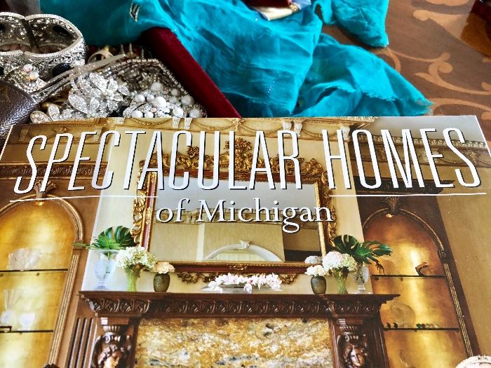 Book “Spectacular Homes of Michigan” in which clients chandelier AND. Dining set were featured