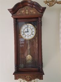 Walnut Case Trend clock. Can Chime hourly, 1/2 hr, and 1/4 hr.