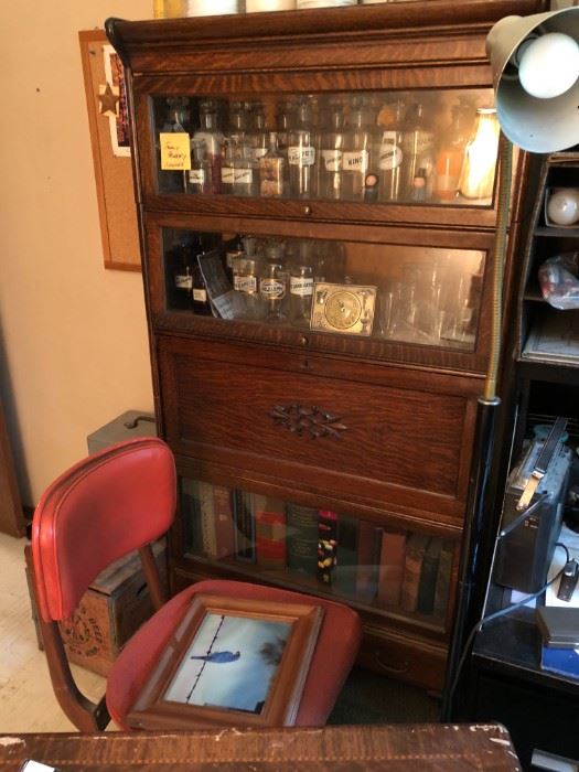 Apothecary cabinet and jars.