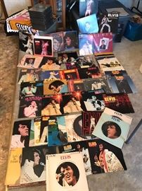 ELVIS COLLECTION: 32 1950s-80s covered/sleeved records in very good shape