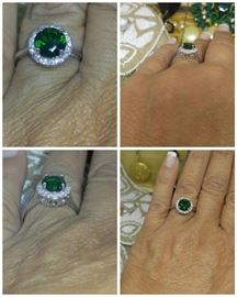 Fine lab created emerald surrounded by AAA brilliant zircons set in sterling silver