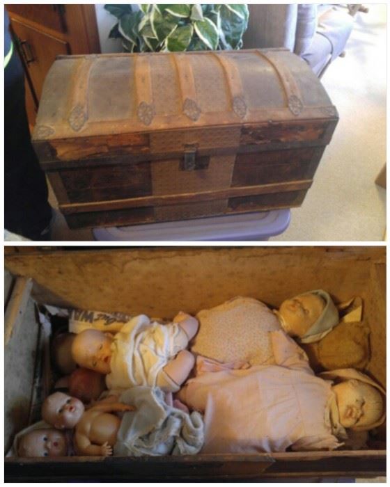 Antique some trunk & some vintage dolls underneath the tray