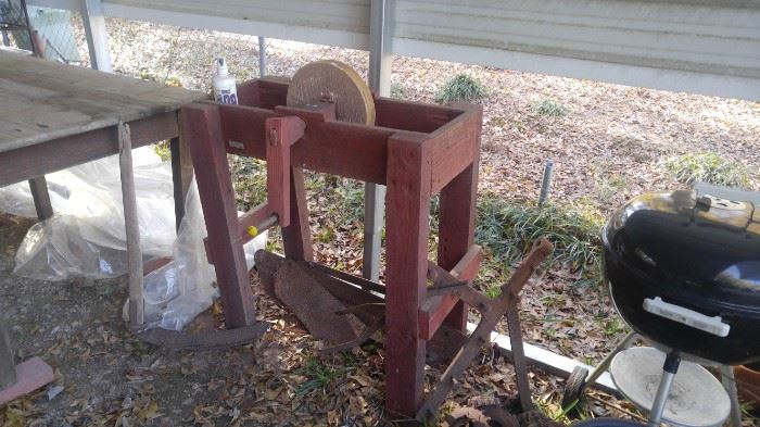 Grinding stone in holder restored in 1983