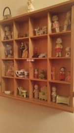 Shadow box of miniature vintage figurines