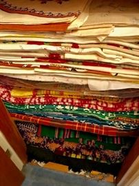 Large assortment of linens/tablecloths