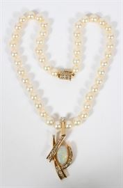 LADY'S CULTURED PEARL NECKLACE WITH DIAMOND AND YELLOW GOLD PENDANT, 72 GRAMS, L 18"
Lot # 2079 