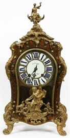 FRENCH, LOUIS MANGEANT, BOULLE AND BRONZE MANTLE CLOCK H 29" W 14"
Lot # 1031  