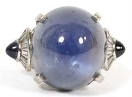 34.77CT CABOCHON CUT STAR SAPPHIRE (GIA), DIAMOND, & PLATINUM RING, SIZE 6.75
Lot # 1105  