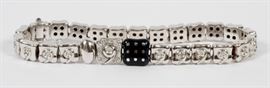 18KT GOLD AND DIAMOND BRACELET, L 6 1/4"
Lot # 1111 