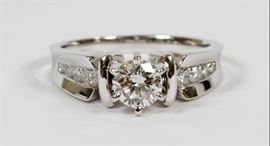 0.47CT CENTER ROUND & 0.40CT SIDE DIAMOND RING, 5.2 GRAMS, RING SIZE: 6
Lot # 0029 
