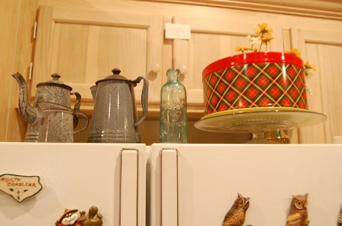 Graniteware tea pots, bottle moved to living room showcase