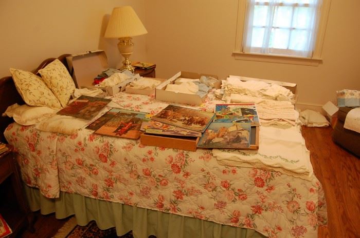 Maple bed-full, that matches 2 dressers and an end table, plus children's old clothes and linens and linens and linens