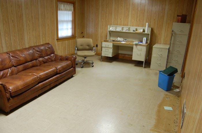Couch, office desk, chair and file cabinets