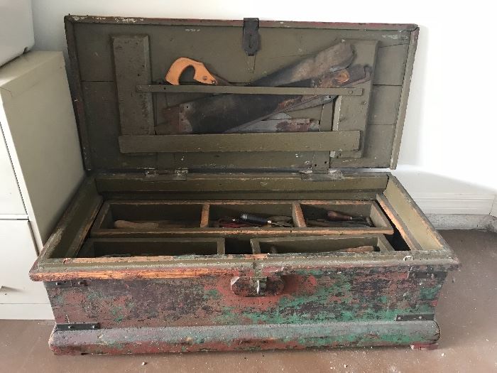 Old tool chest with some old tools 