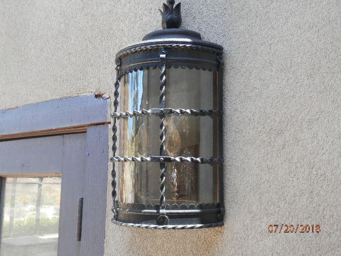 Outdoor hand made sconce...wrought iron and steel with hand blown glass.  These are heavy duty.  ********$30 each********have 20+  Call Now for immediate appointment.  (760) 975-5483    (760) 445-8571